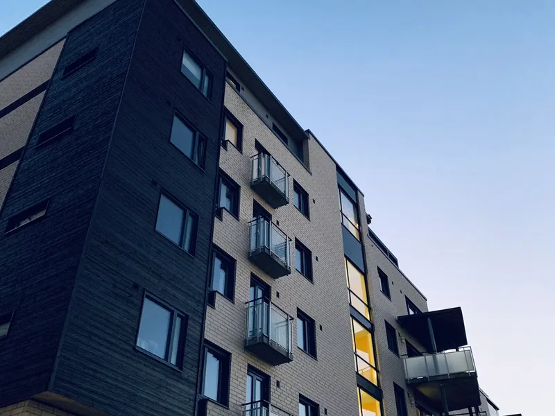 Modern apartment residential building view under clear sky